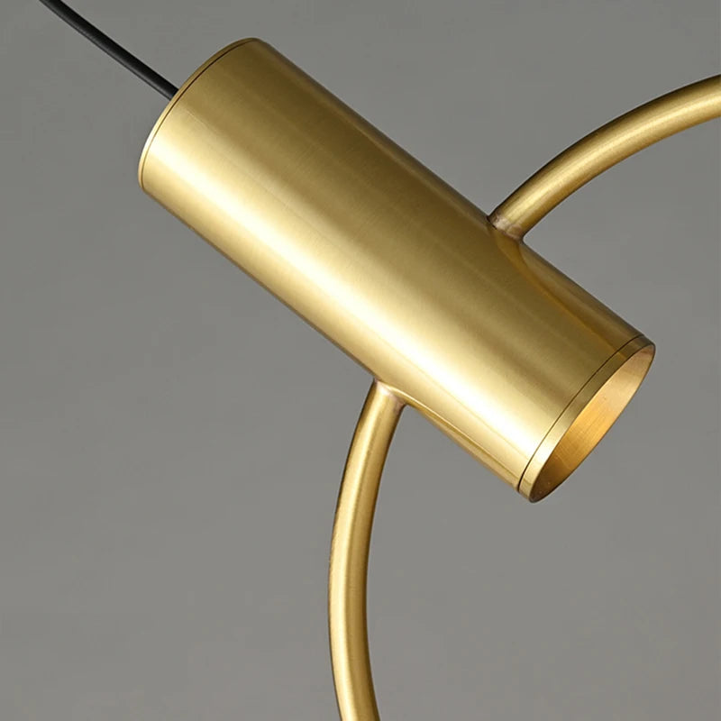 lustre minimaliste en laiton à 3 anneaux avec gradation variable