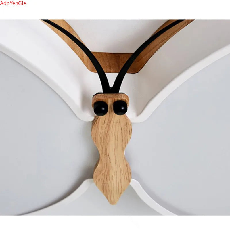 lustre-moderne-en-bois-avec-papillon-led-pour-enfants-4.png