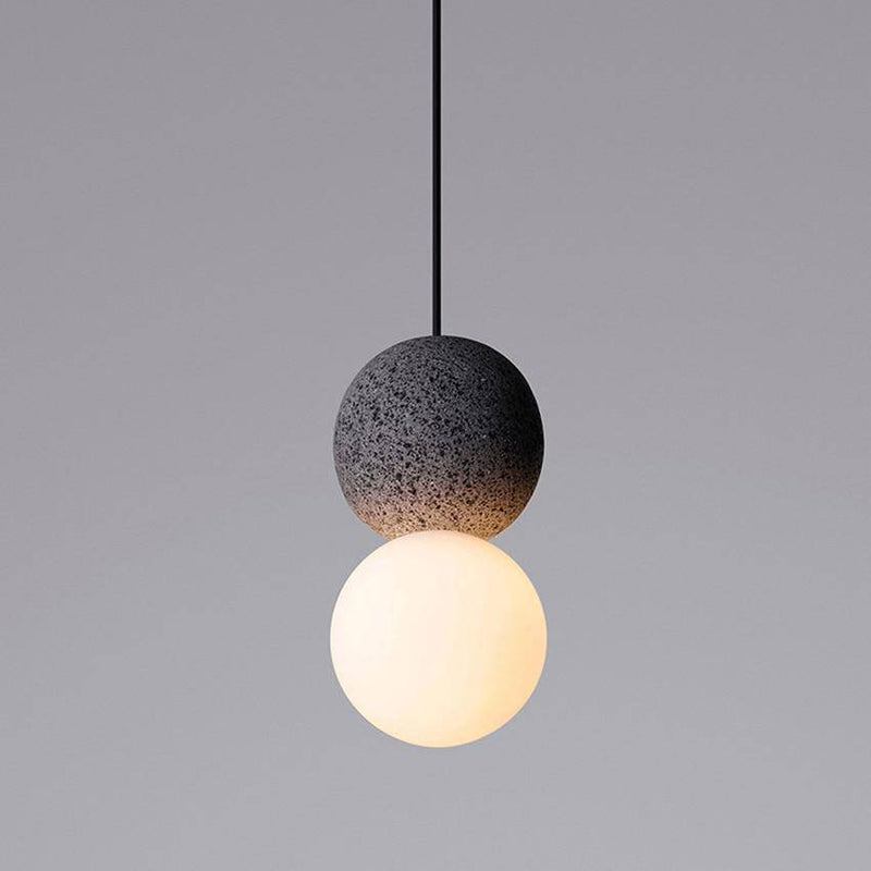 Suspension design en boule en ciment façon terrazzo LED