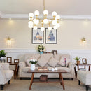 Lustre design doré style cuivre avec boules
