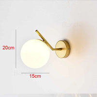 applique murale créative en métal avec boule de verre moderne