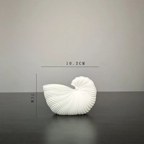 vase en céramique coquillage pour décoration florale artisanale