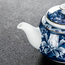 Théière chinoise porcelaine motif traditionnel portable artisanale