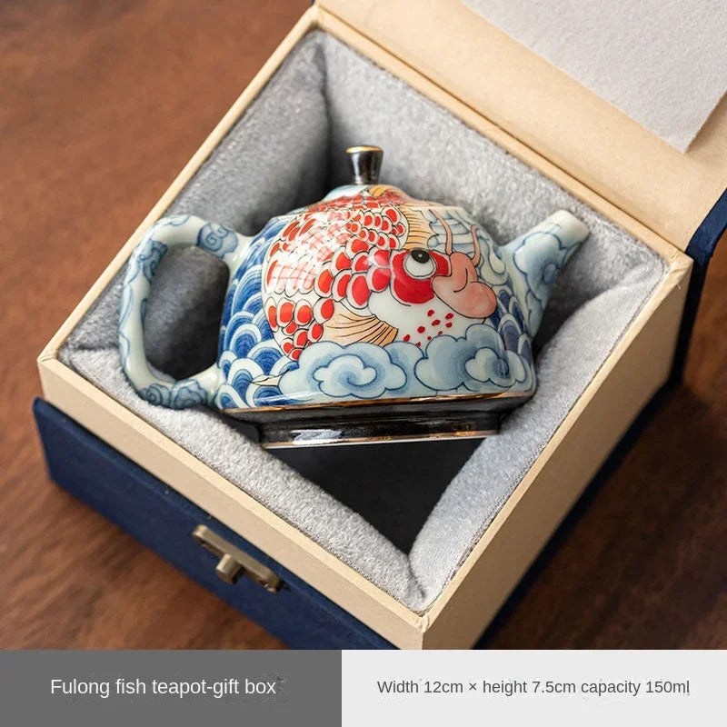 Théière chinoise porcelaine décor sous couverte infuseur artisanal