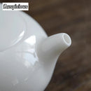 Théière dehua porcelaine poignée latérale style jade ancien