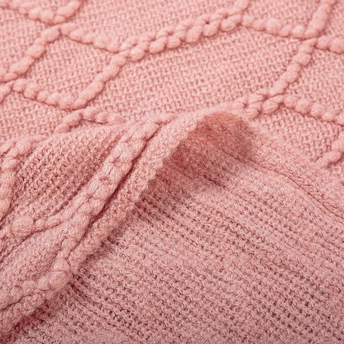 Plaid tricot acrylique carreaux pompons salon chambre