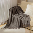 plaid tricot doux pompons style carreaux canapé lit