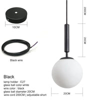 suspension moderne avec abat-jour en boule de verre doré