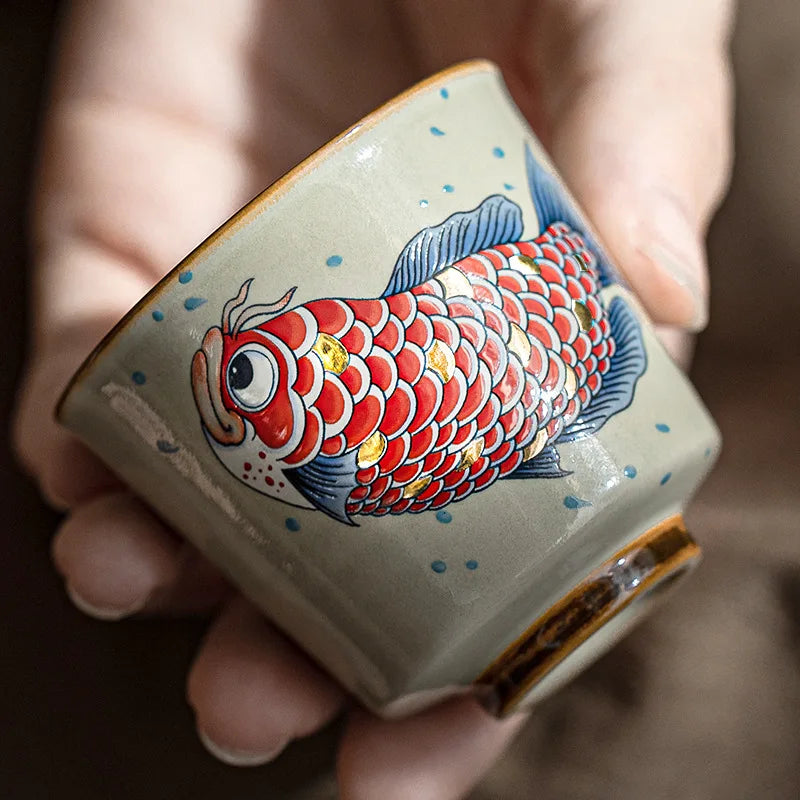 Tasse à thé chinoise motif arowana en céramique