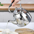 Bouilloire inox motif fleur infuseur amovible poignée isolante