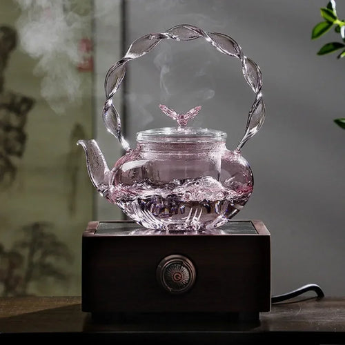 Théière verre borosilicate poignée articulée fonction papillon