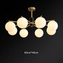suspension nordique luxe en cuivre doré avec boules de verre blanches