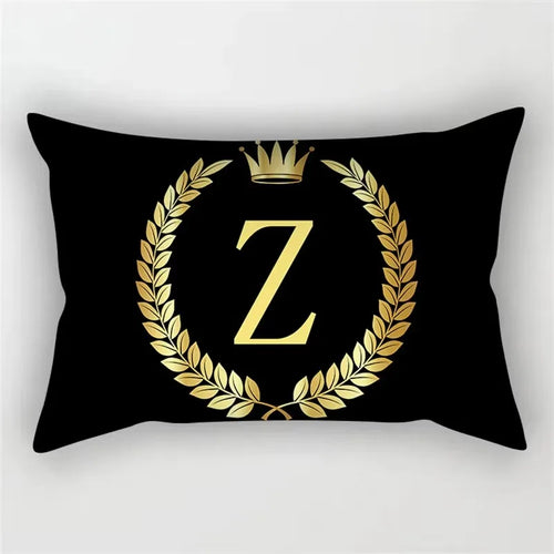 housse de coussin décorative motif lettres noires et dorées