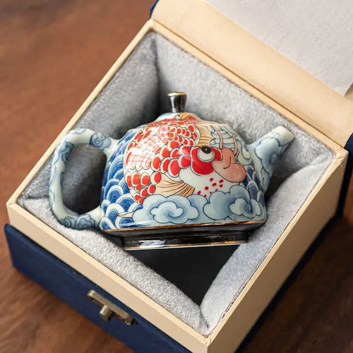Théière chinoise porcelaine décor sous couverte infuseur artisanal
