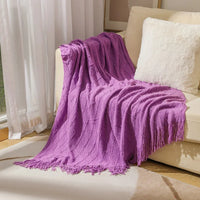 Plaid tricot acrylique carreaux pompons salon chambre