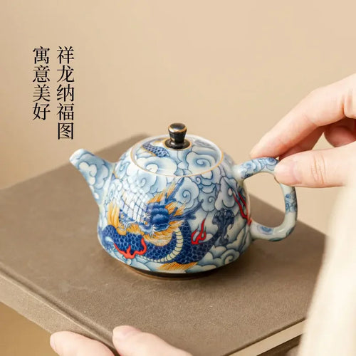 Théière chinoise porcelaine décor sous couverte infuseur artisanal