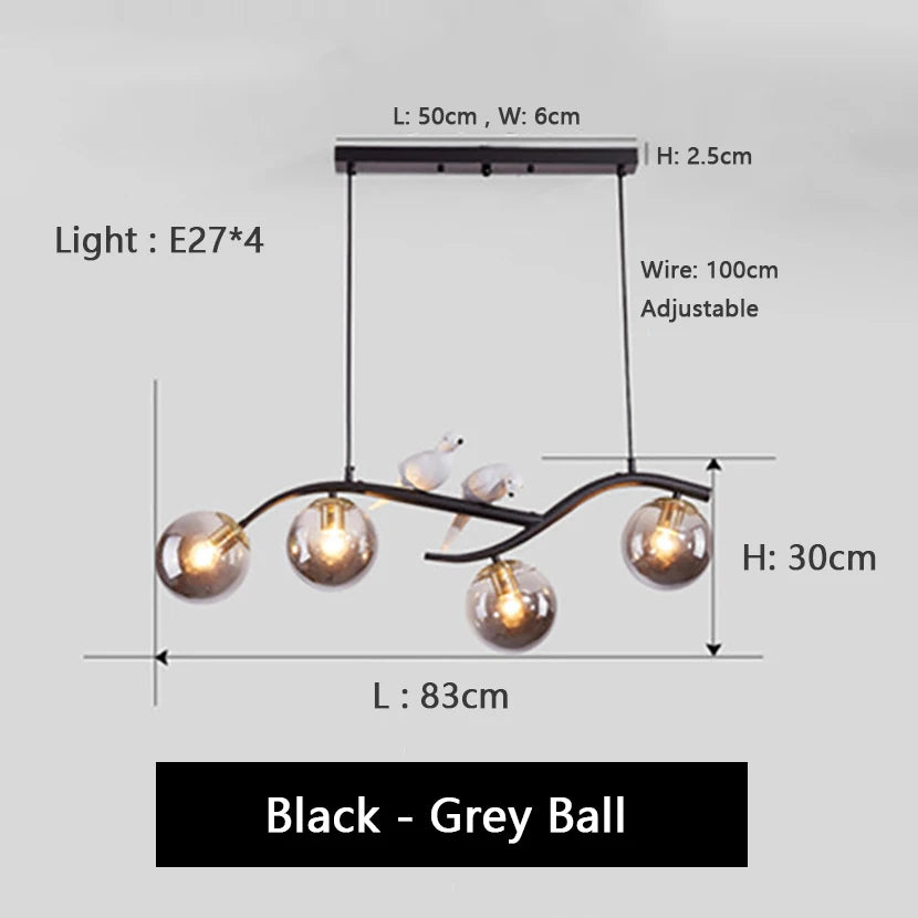 lustre en fer avec oiseau et boule de verre suspendue