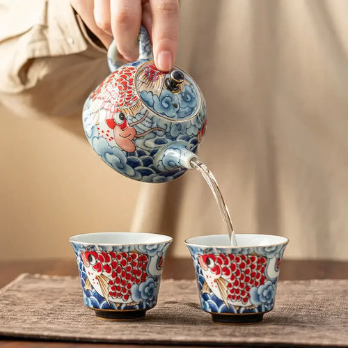 Théière chinoise porcelaine décor sous couverte infuseur artisanal