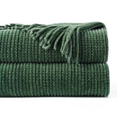 Plaid maille chenille a pompons motif carreaux decoratif