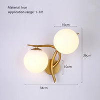 plafonnier moderne en cuivre doré avec boule de verre et led