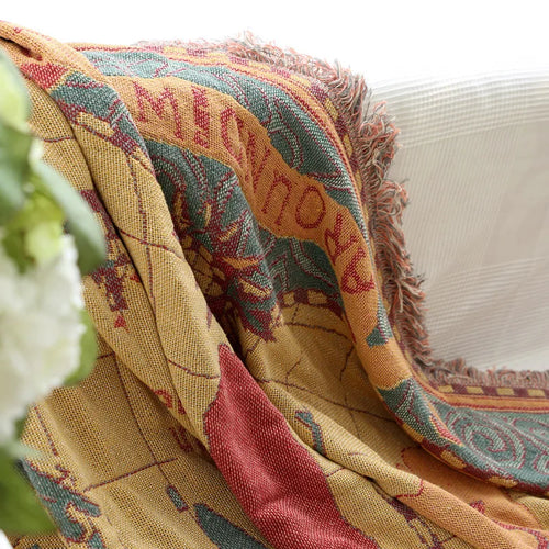 Plaid bohème tricoté motif carte du monde salon