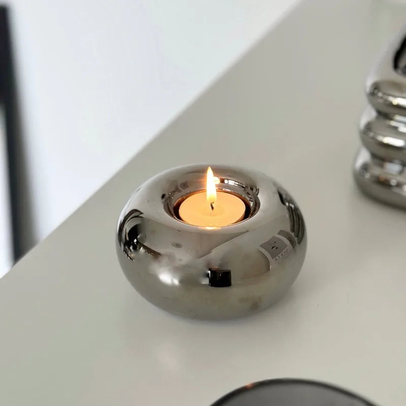 lustre moderne en céramique argentée avec bougies décoratives