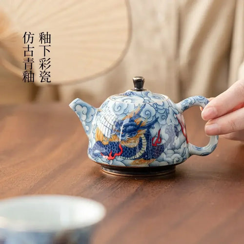 theiere chinoise en porcelaine decor traditionnel avec infuseur