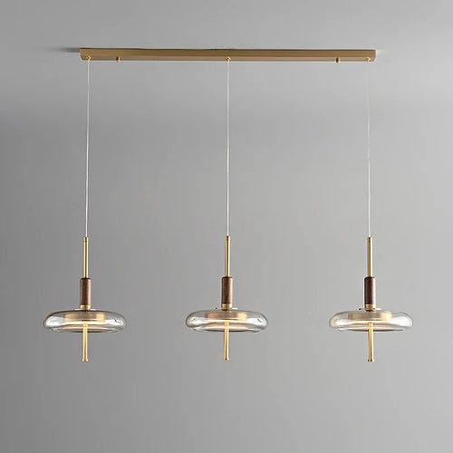 suspension en laiton et noyer design nordique luxueux