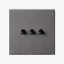 interrupteur-triple-3-voies-en-acier-gris-fonc-bross-0.png