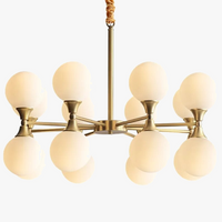 Lustre design doré style cuivre avec boules