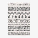Tapis rectangle aux motifs géométriques blancs et noirs style Keecy B