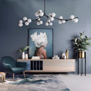 Lustre moderne LED branches métalliques et lampes en verre Yolan