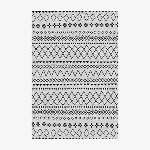 Tapis rectangle aux motifs géométriques blancs et noirs style Keecy A