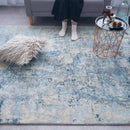 Tapis moderne rectangle au style abstrait beige et bleu