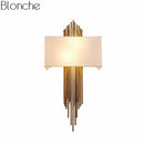 Applique murale design à LED dorée avec abat-jour blanc Luxury