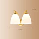 Applique murale moderne LED doré avec abat-jour arrondi blanc Herity