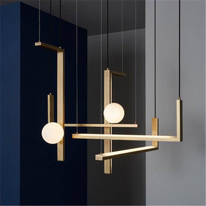 Suspension LED aux formes géométriques design et finitions cuivrées