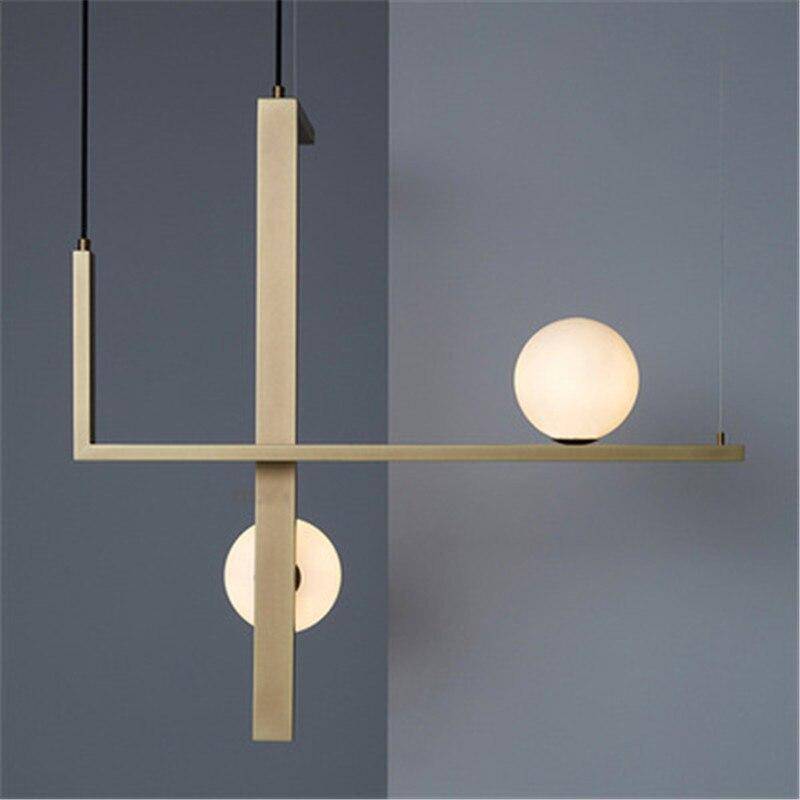 Suspension LED aux formes géométriques design et finitions cuivrées