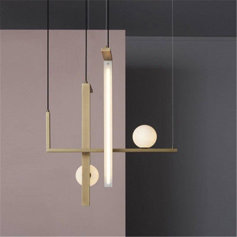 Suspension LED aux formes géométriques design et finitions cuivrées