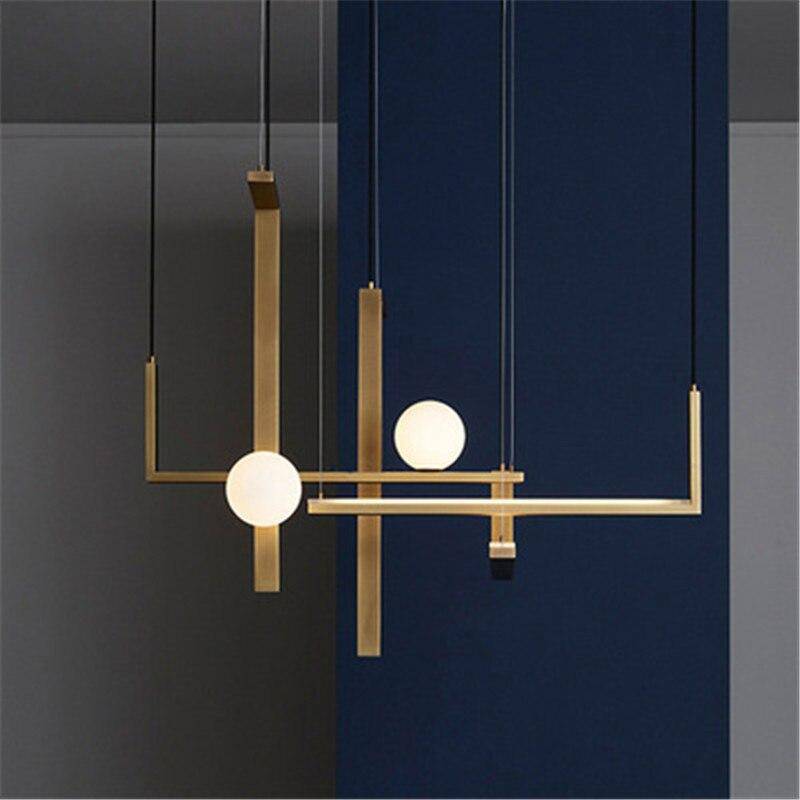Suspension LED aux formes géométriques design et finitions cuivrées