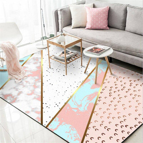 Tapis rectangle rose et doré style géométrique