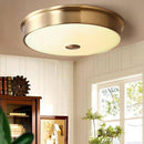 Plafonnier design LED rond en métal doré