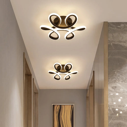 Plafonnier moderne LED avec formes arrondies en métal Diena