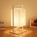Lampe de bureau rétro en tissu et métal blanc Miot