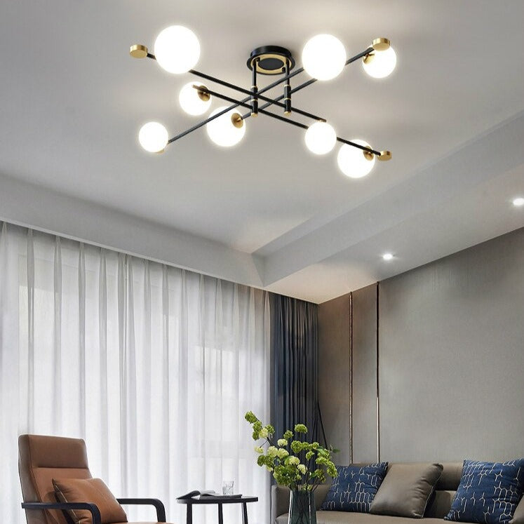 Lustre moderne LED bras croisés noirs et détails dorés Poline - vue 3 sur 9