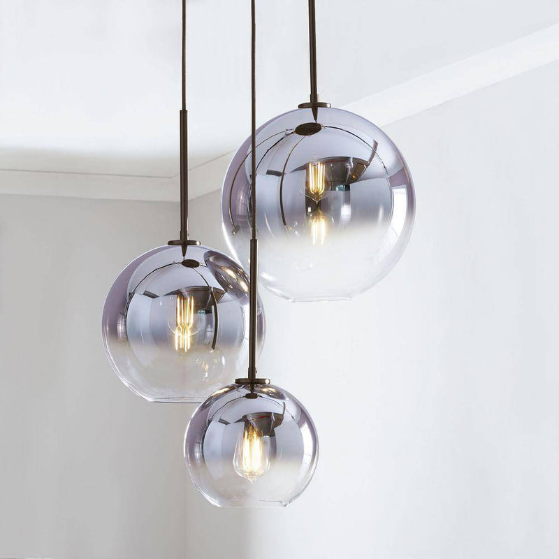Suspension design boule en verre ambré Loft