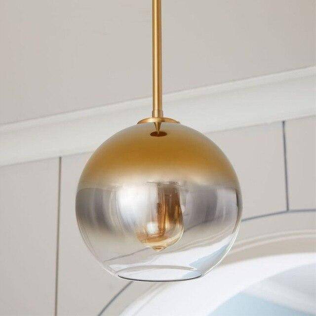 Suspension design boule en verre ambré Loft