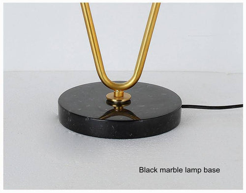 Lampe de chevet design avec deux branches doré et boules en verre