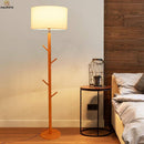 Lampadaire avec abat-jour en tissu et pied en bois à branches