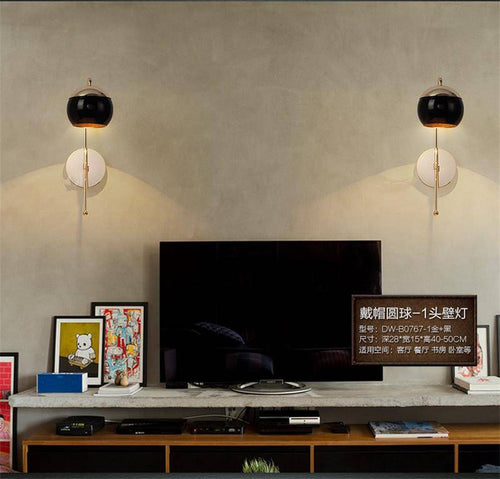 Applique murale design doré à LED ajustable